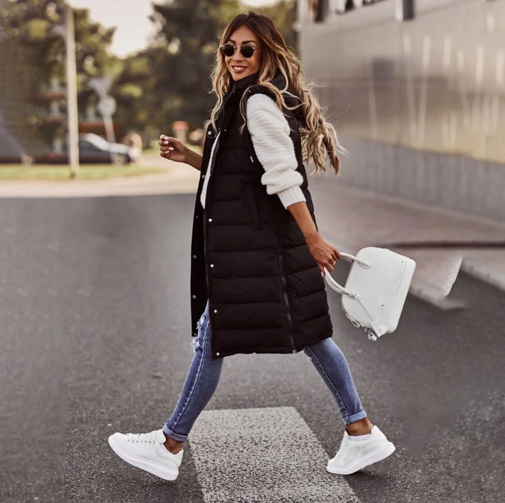 Sleeveless women's coat in long length - Stylish design for modern women - Cozy and warm for winter